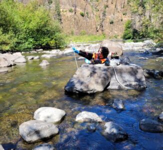 US Forest Service staff using eDNA sampling equipment in the upper Clackamas